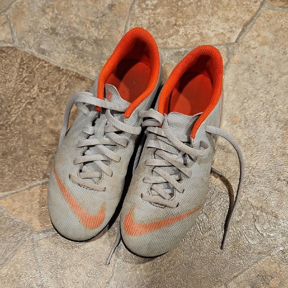 Nike Gray Soccer Cleats with Orange Highlights